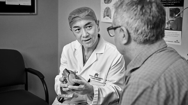 Yong Shin, M.D., of the Kaiser Sunnyside Medical Center in Clackamas, Ore., consults with a patient.